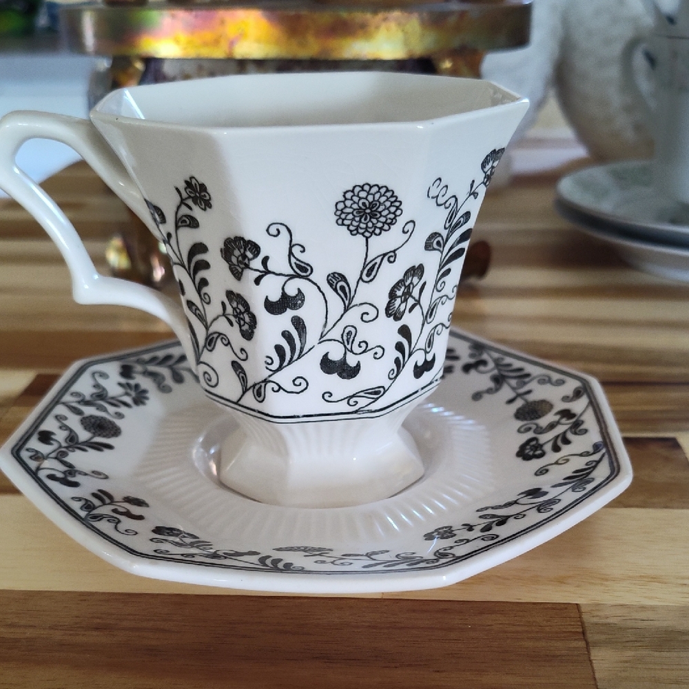 Elegant Black and White Floral Teacup and Saucer Set